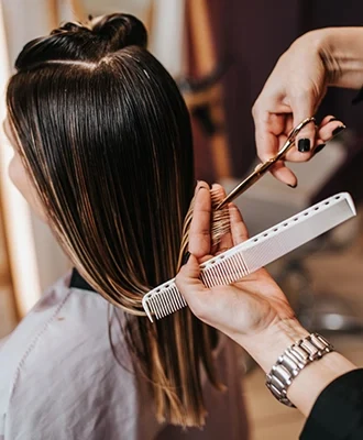 woman getting a haircut